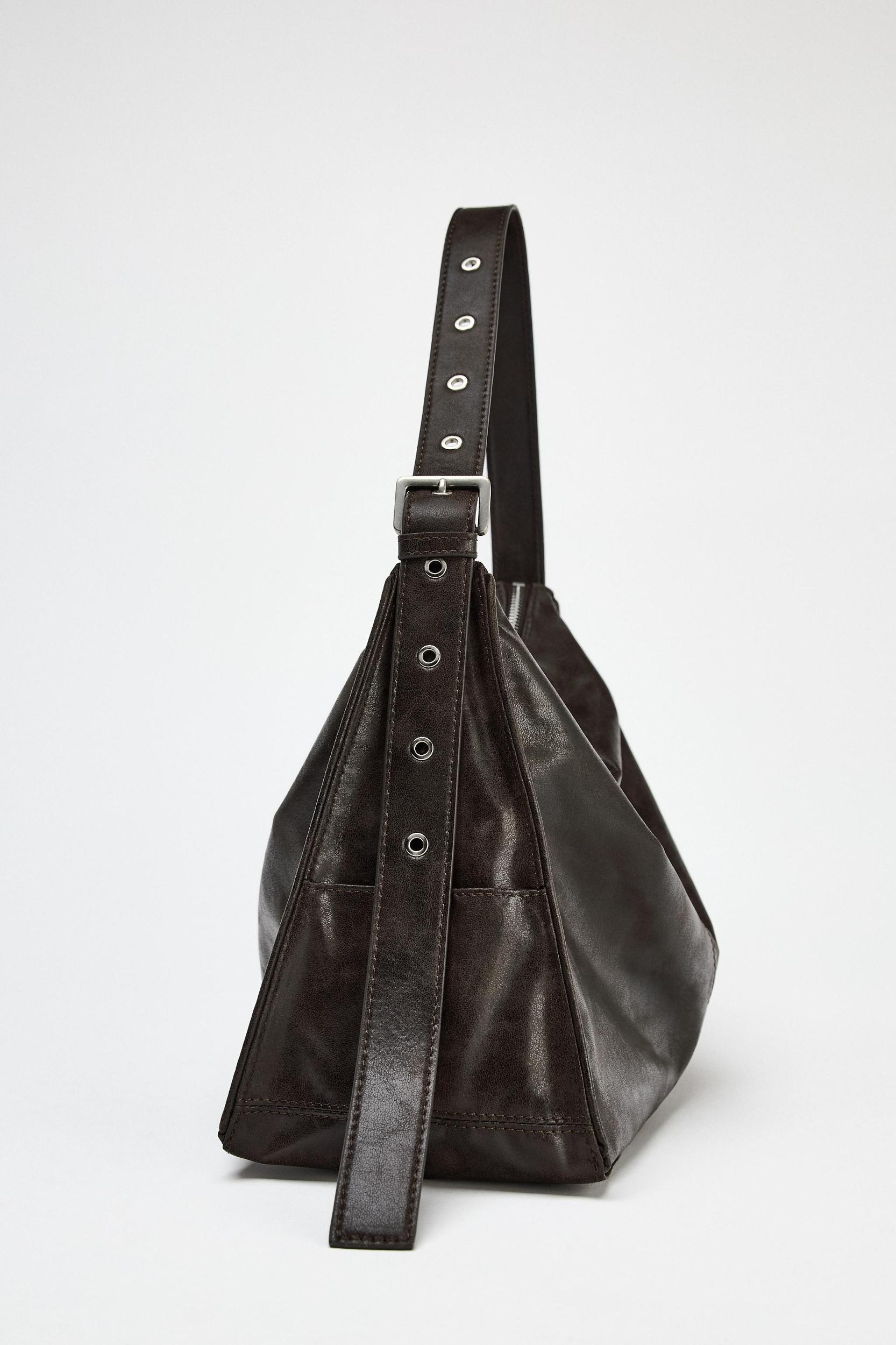 LARGE SOFT BUCKET BAG WITH METAL EYELETS Product Image