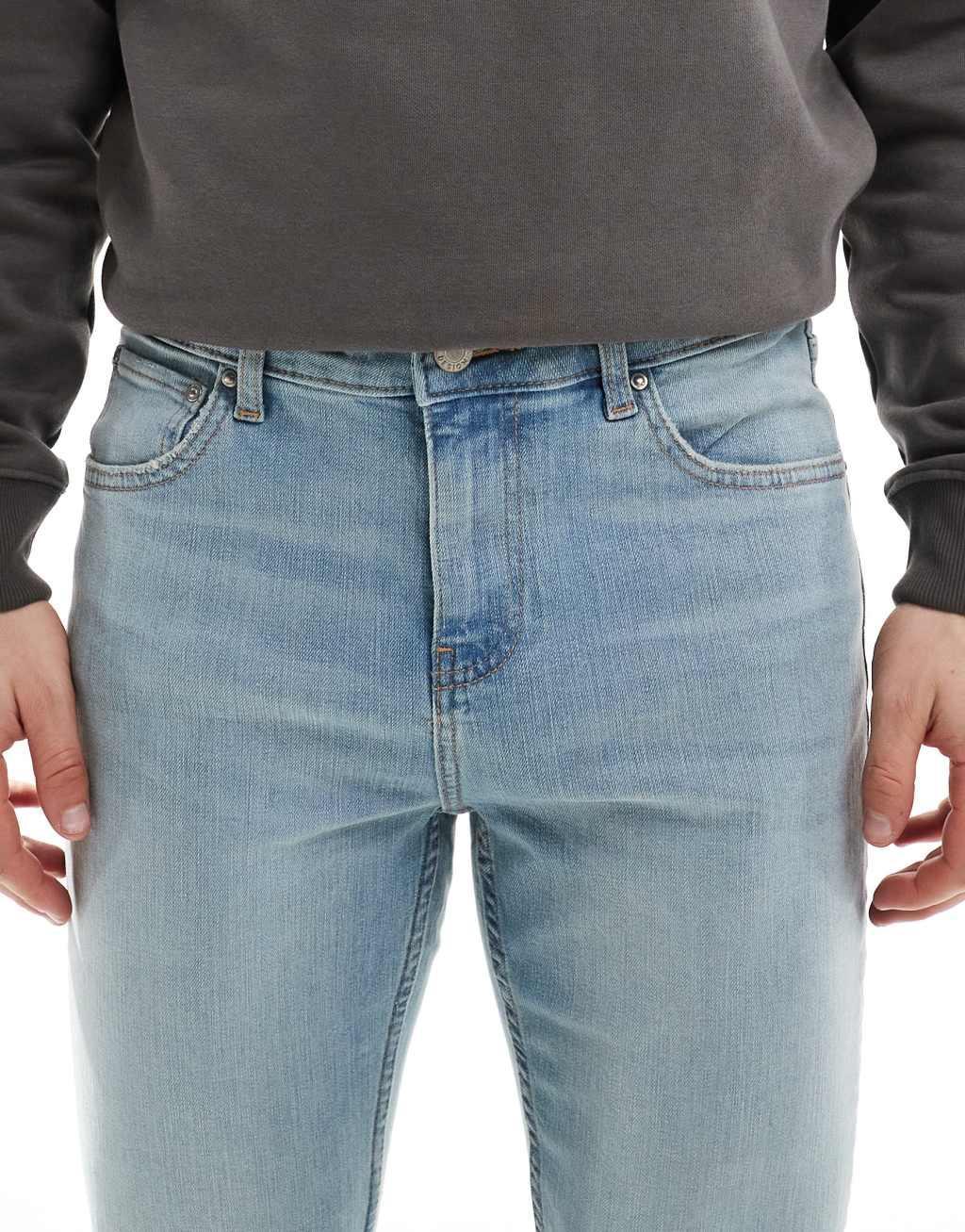 ASOS DESIGN skinny jeans in light wash blue with tint  Product Image
