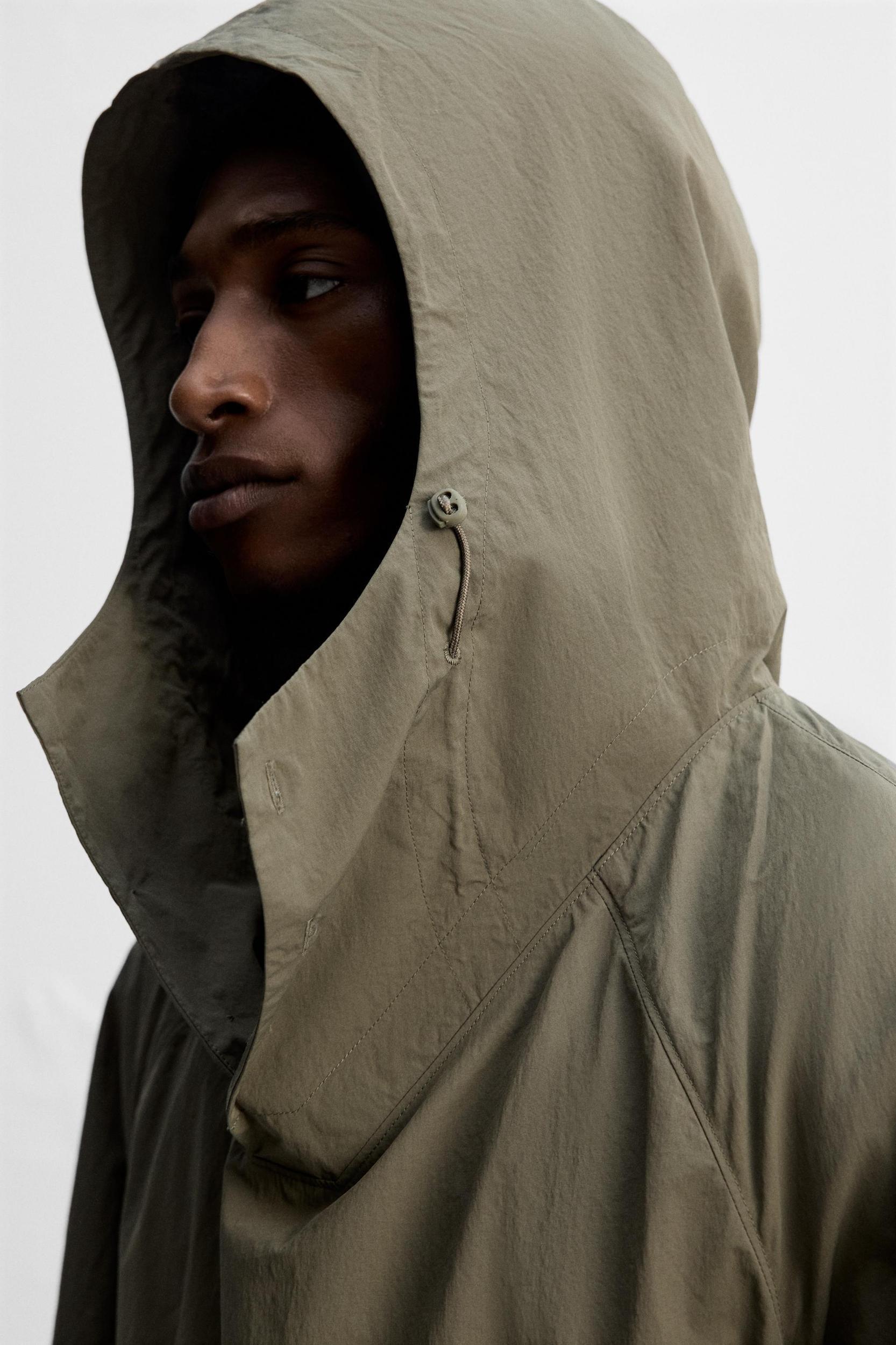TECHNICAL POUCH PARKA Product Image