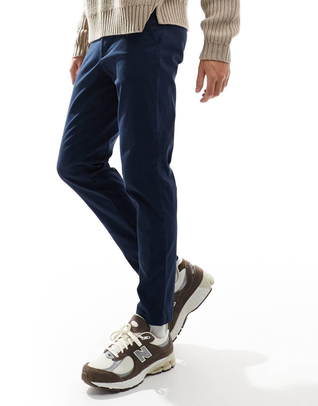 ASOS DESIGN tapered chinos in navy Product Image