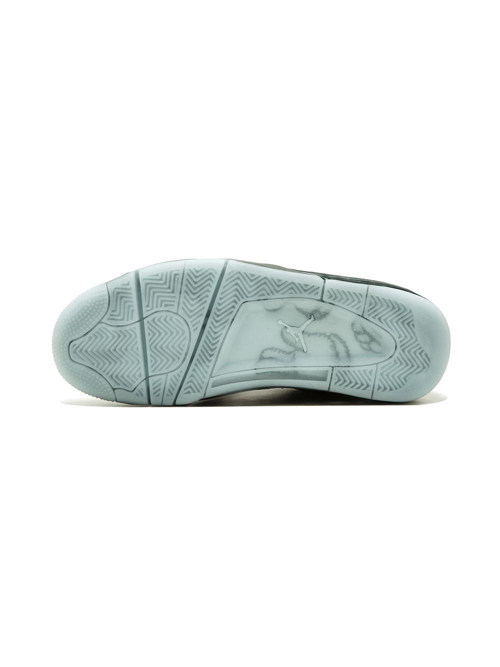 x Kaws Air Jordan 4 Retro "Black" sneakers Product Image