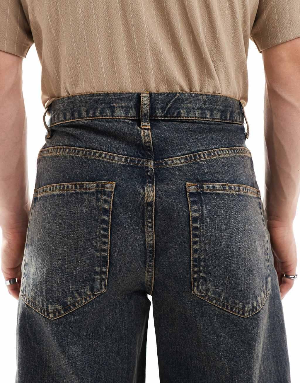 ASOS DESIGN super baggy jeans in tinted mid wash with heavy rips Product Image