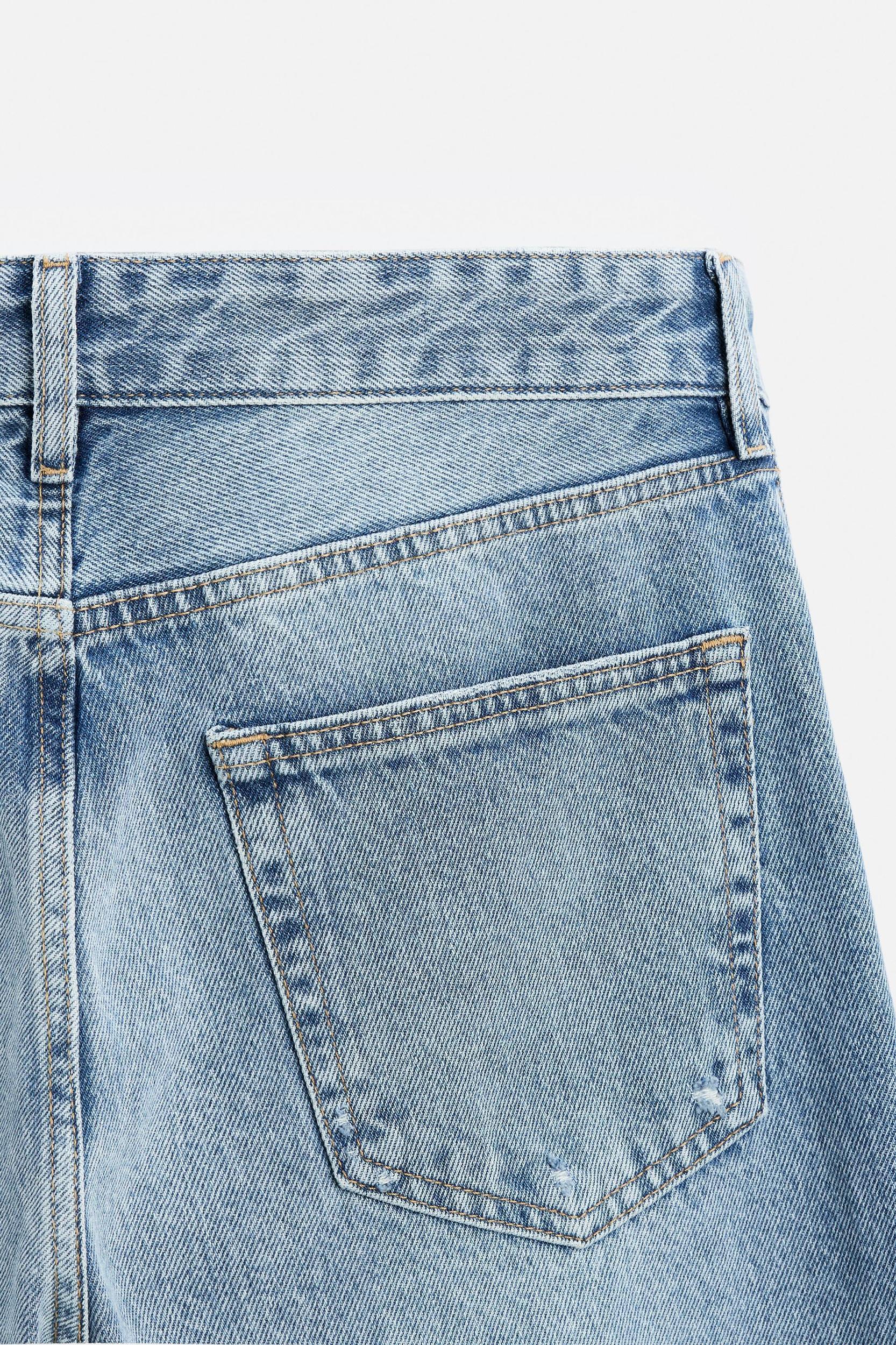 RIPPED FLARE FIT JEANS Product Image