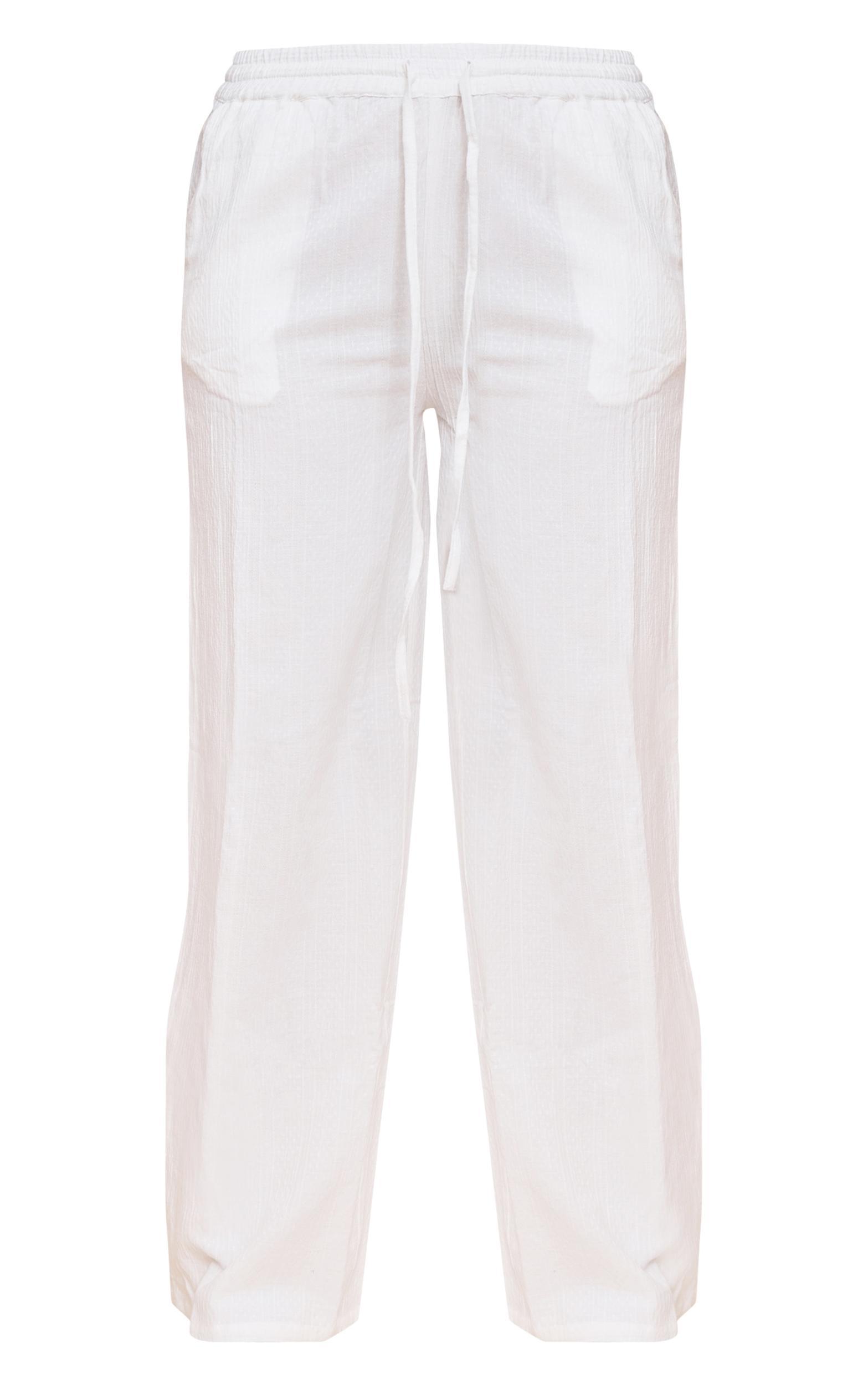 White Textured Mid Rise Wide Leg Pants Product Image