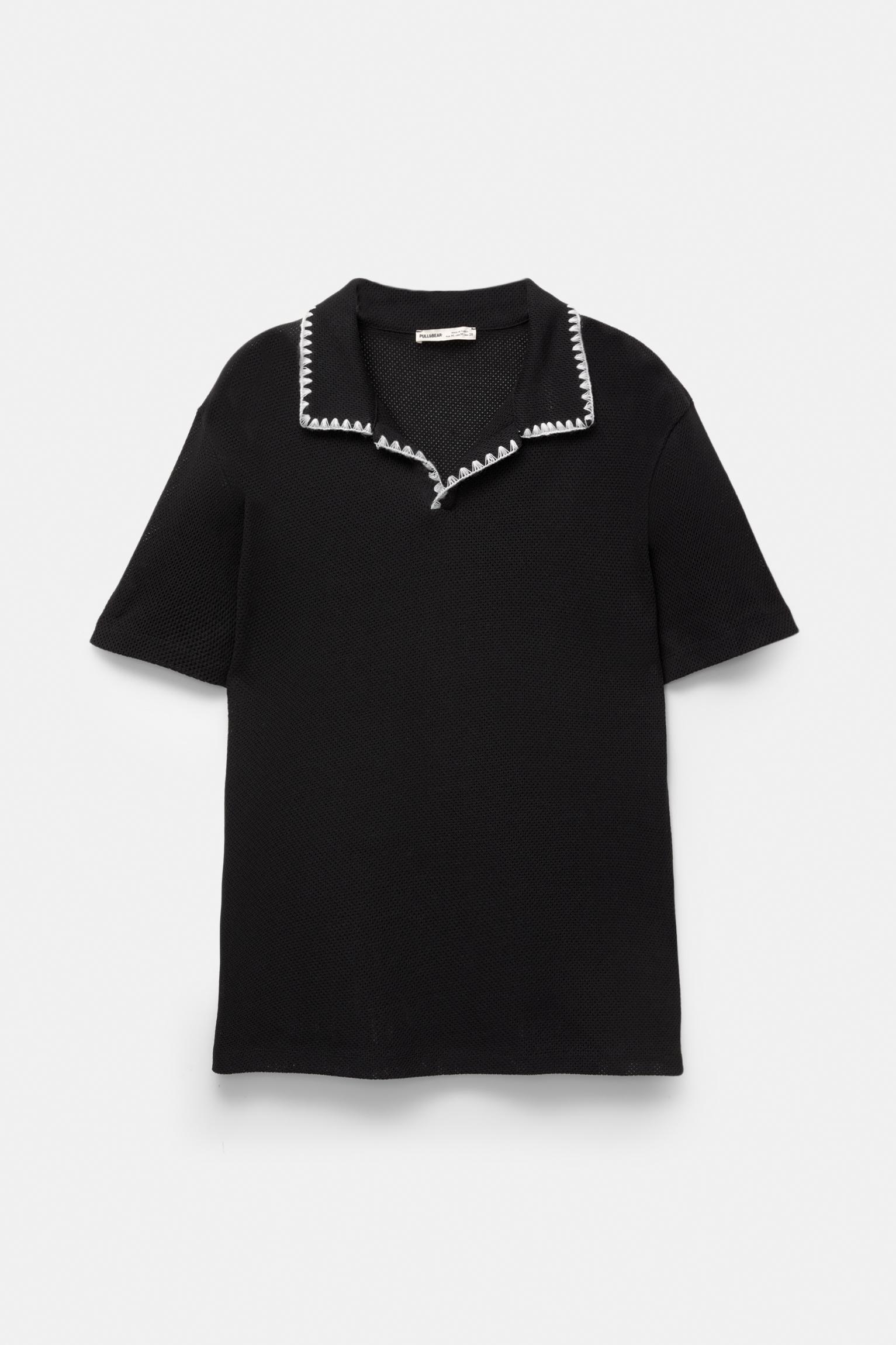 Textured polo shirt with contrast seams Product Image