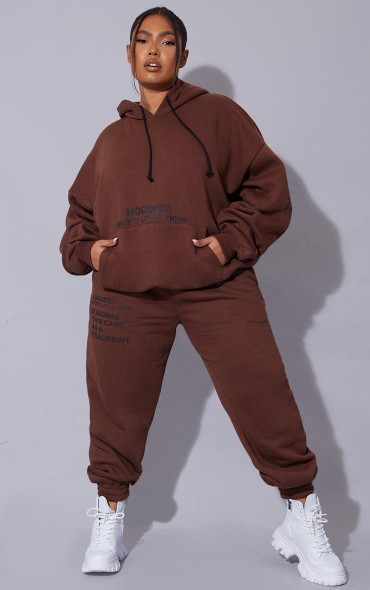 PRETTYLITTLETHING Plus Chocolate Oversized Fit Graphic Printed Hoodie Product Image