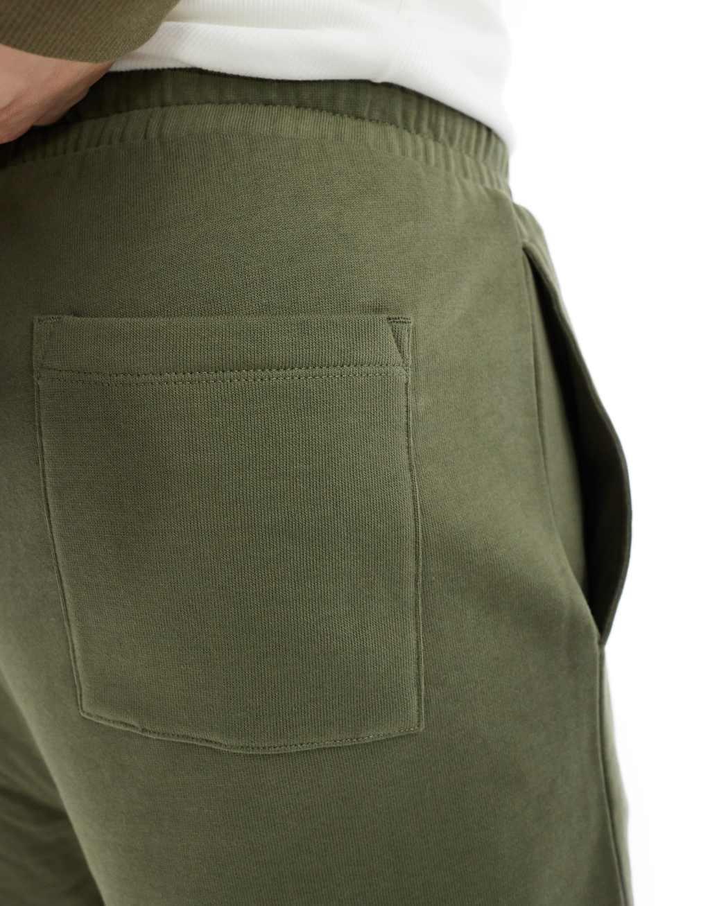 ASOS DESIGN slim fit shorts in olive Product Image