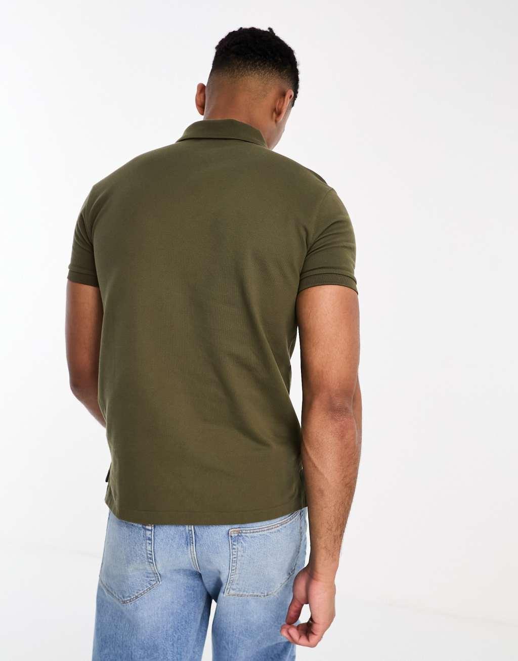 Polo Ralph Lauren icon logo slim fit pique polo shirt in mid green Product Image
