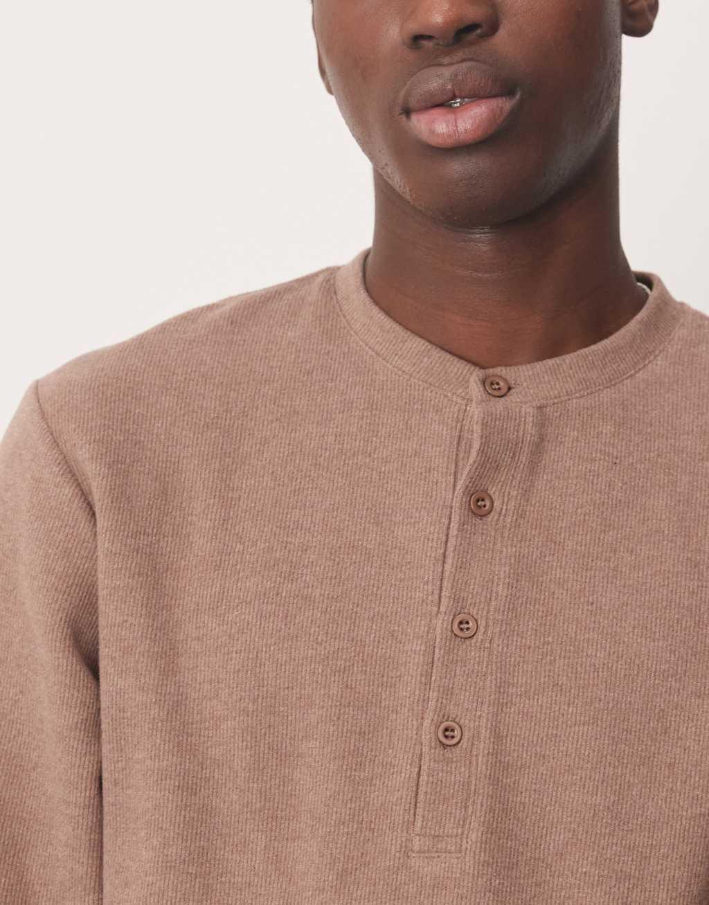 ASOS DESIGN boxy long sleeve t-shirt in brushed rib with henley neck in brown Product Image