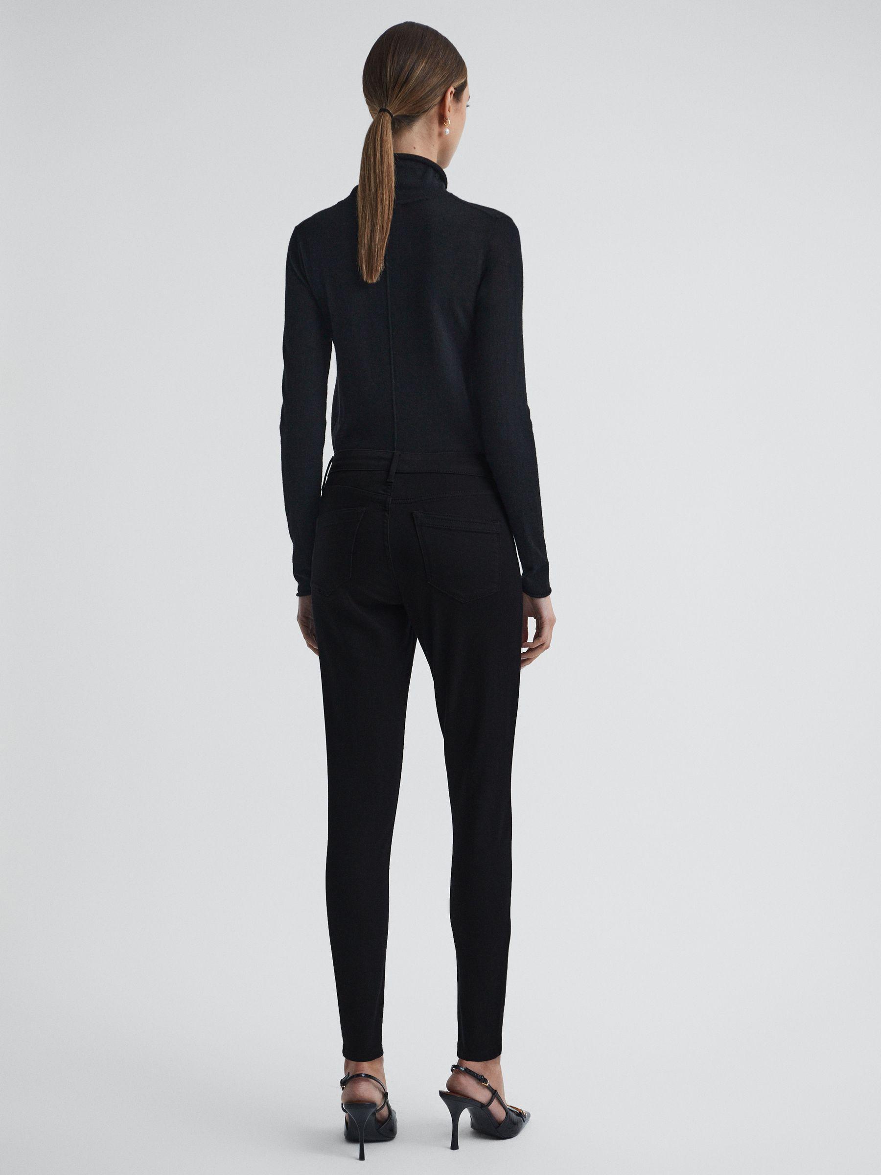 Mid Rise Skinny Jeans in Black Product Image