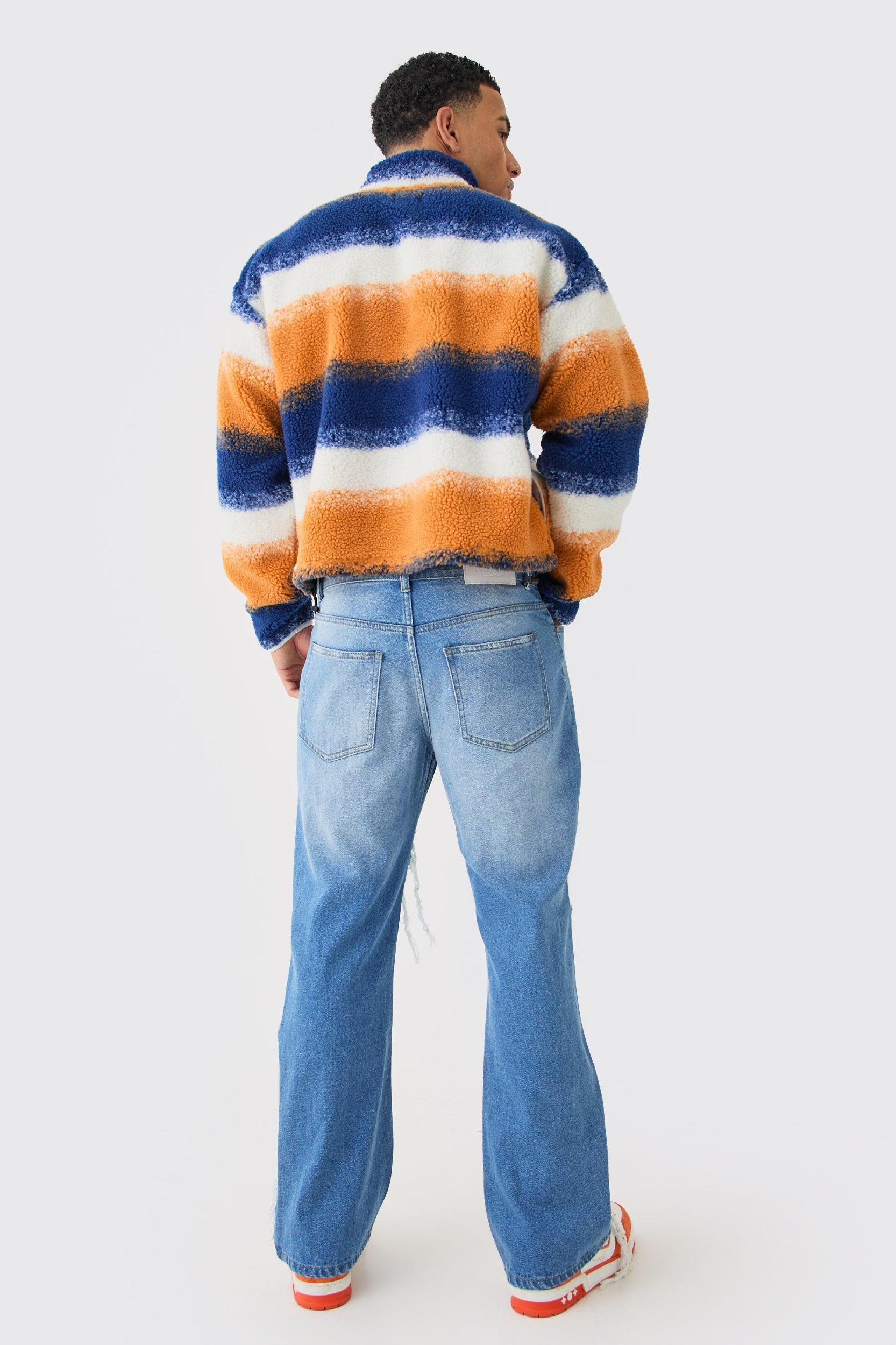 Relaxed Rigid Flare Rip & Repair Applique Jeans | boohooMAN USA Product Image