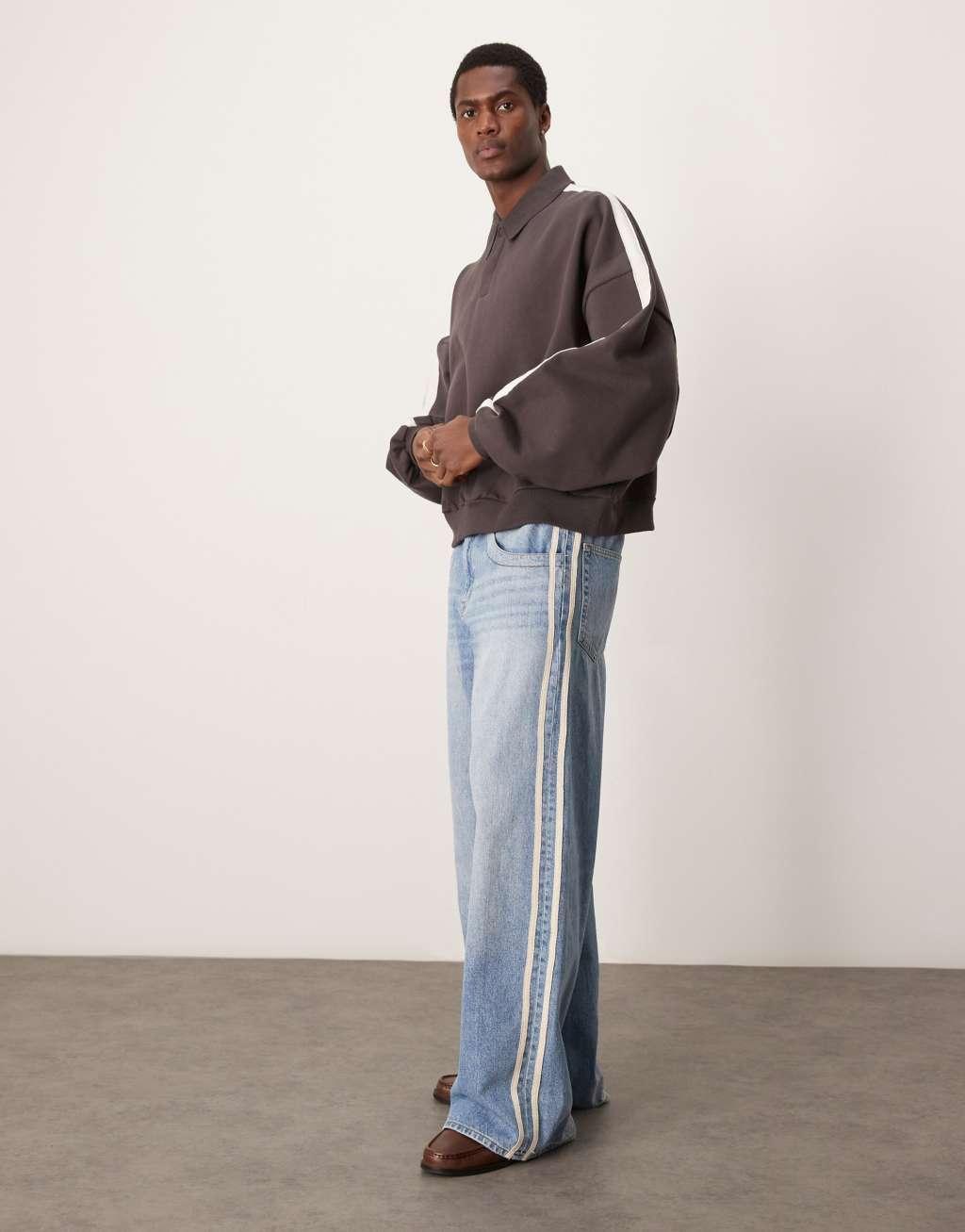ASOS DESIGN heavyweight extreme oversized rugby sweatshirt with taping detail in dark brown Product Image