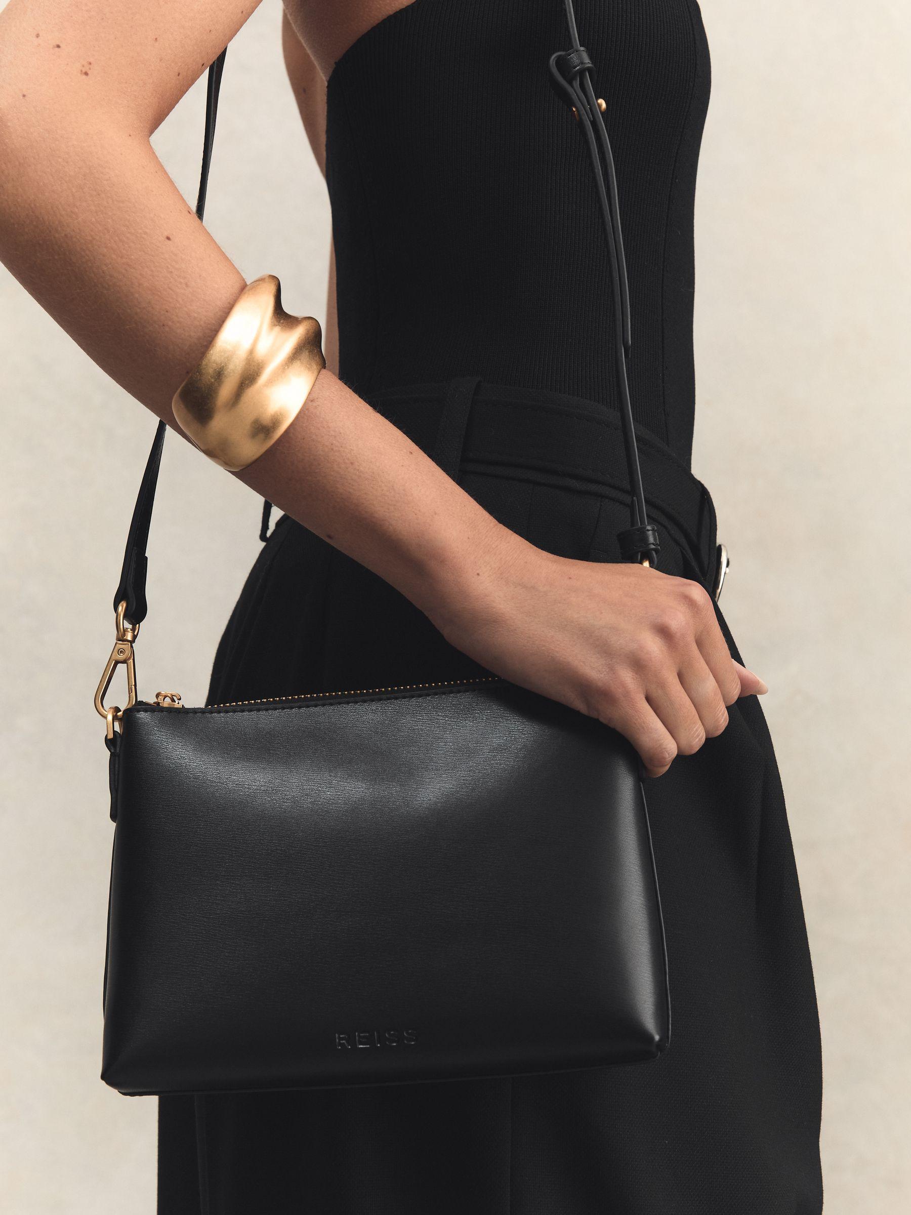 Leather Double Strap Pouch Bag in Black Product Image