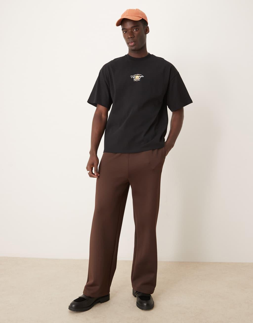 Selected Homme oversized T-shirt with sun backprint in black Product Image