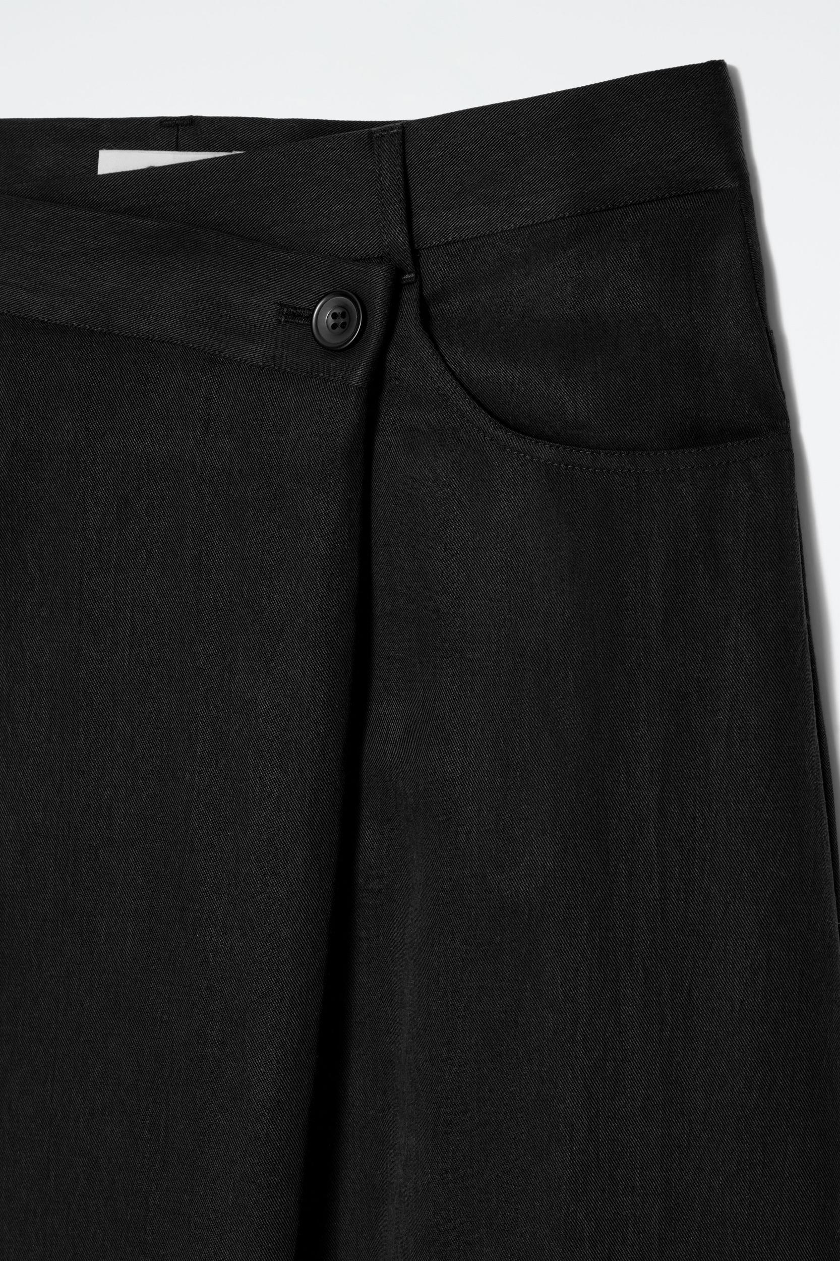 ASYMMETRIC FLUID MIDI SKIRT Product Image