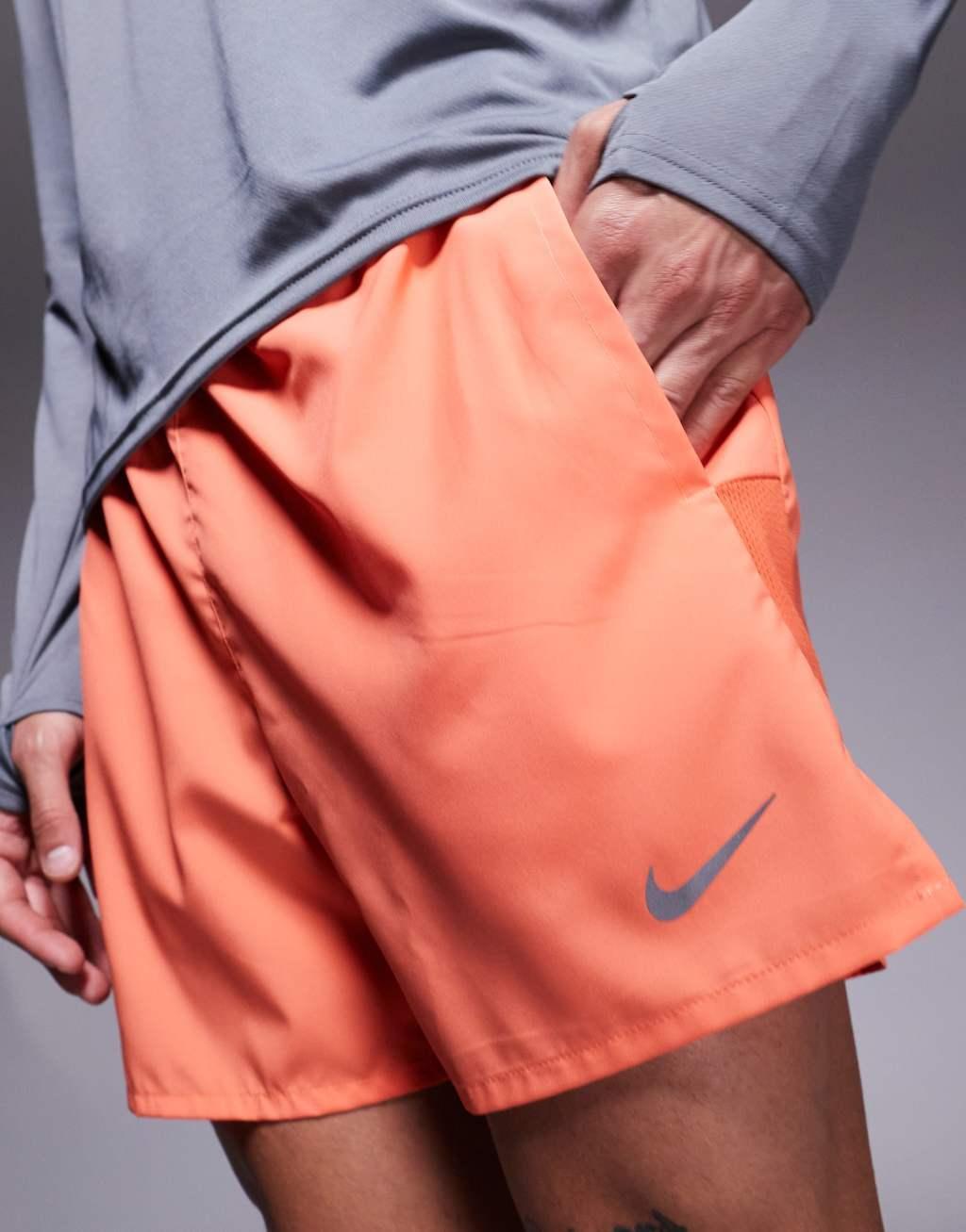 Nike Running Challenger Dri-FIT 5 inch shorts in orange Product Image