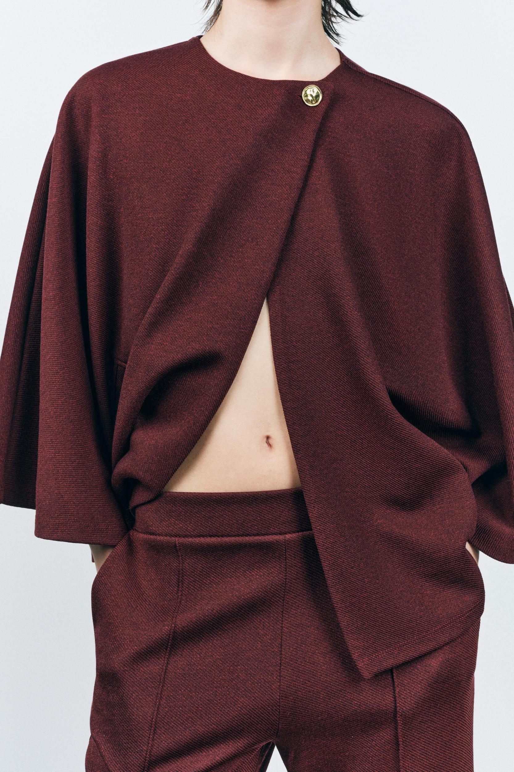BUTTON CAPE Product Image