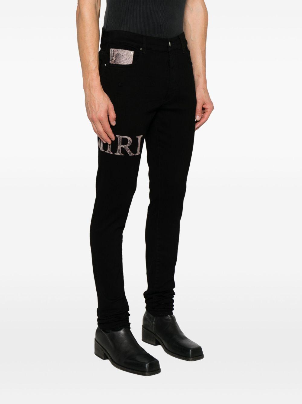 Snake Logo jeans Product Image