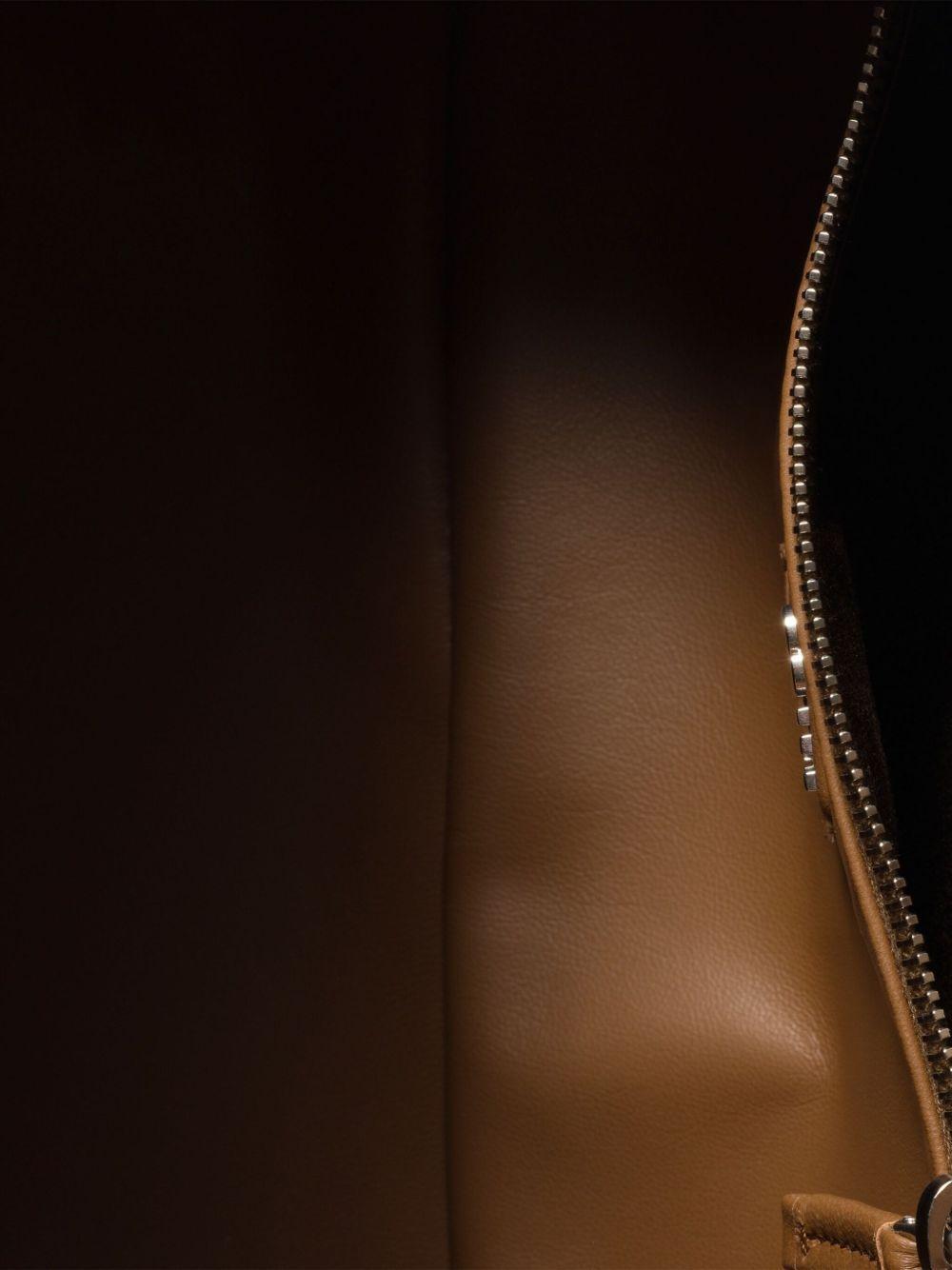 Pocket leather zipped tote bag Product Image