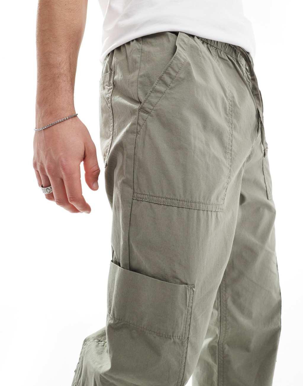 ASOS DESIGN pull on cargo sweatpants in brown Product Image
