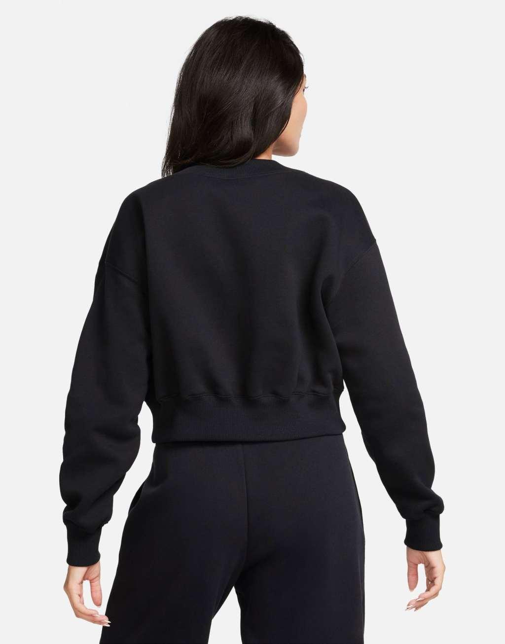 Nike mini swoosh v-neck cropped sweatshirt Product Image