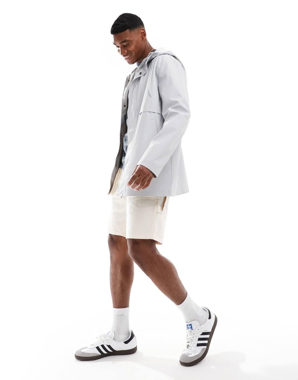 ASOS DESIGN shower resistant rubberized rain jacket in gray Product Image