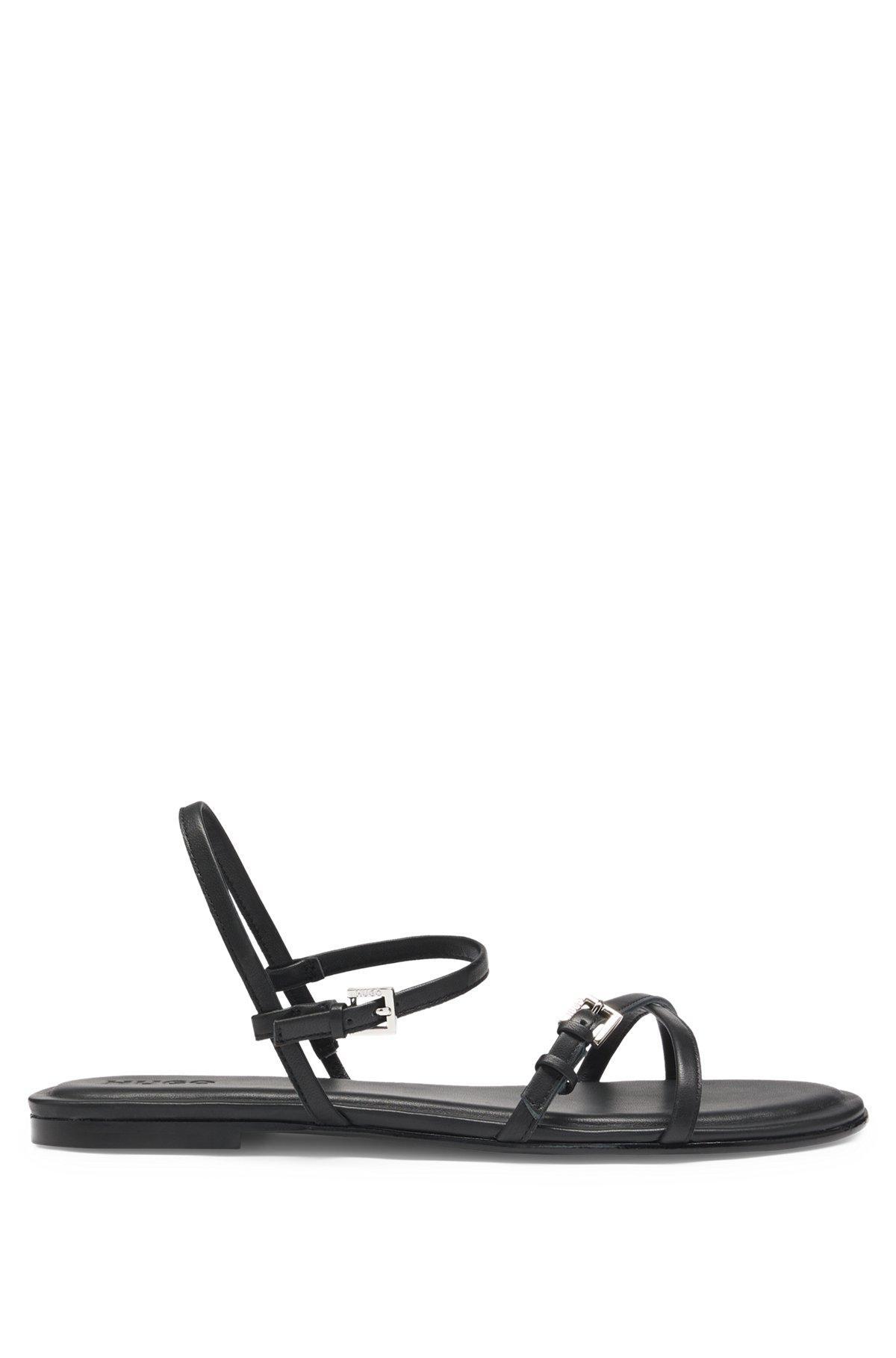 Flat sandals in nappa leather with logo buckles Product Image