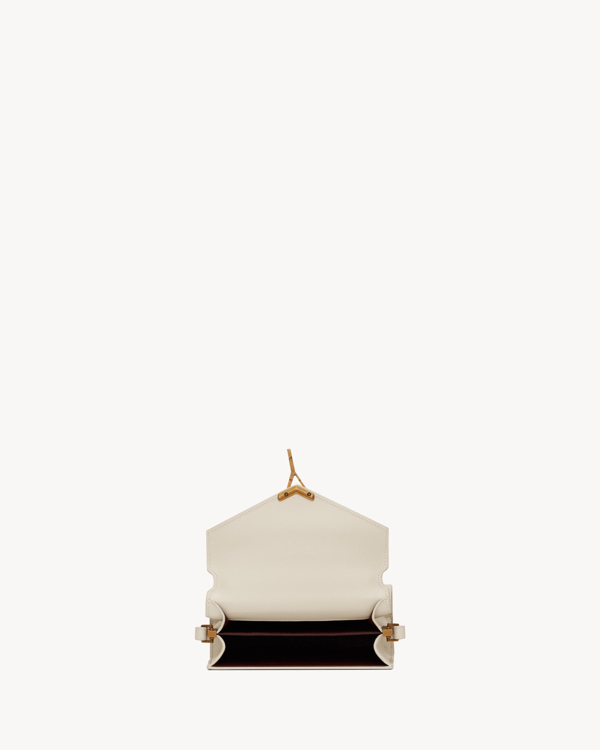 CASSANDRA Mini top handle bag in grain de poudre embossed leather Product Image