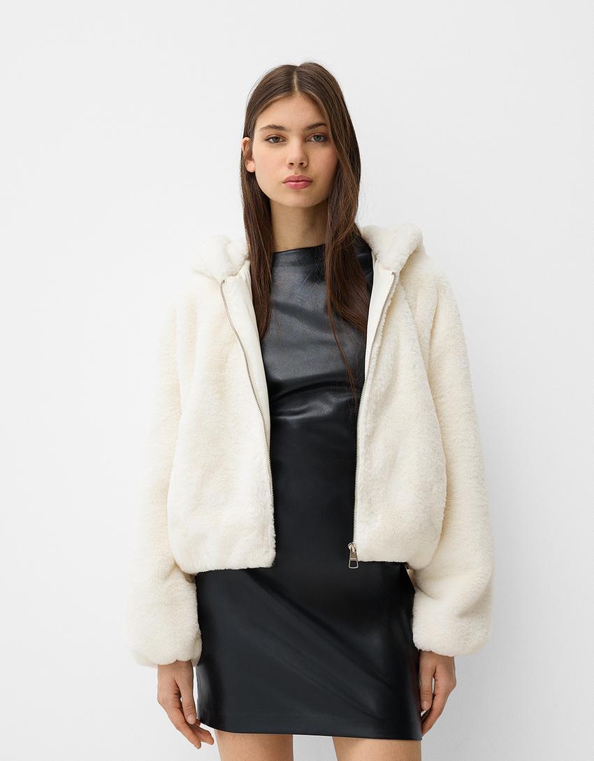 Quilted jacket with faux fur hood Product Image