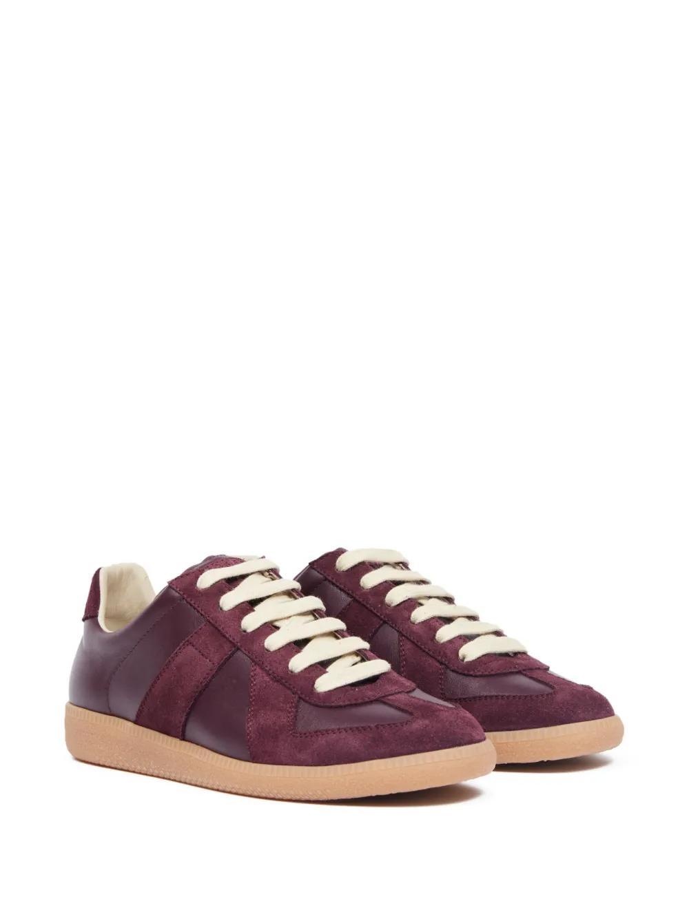 Replica low-top leather sneakers Product Image