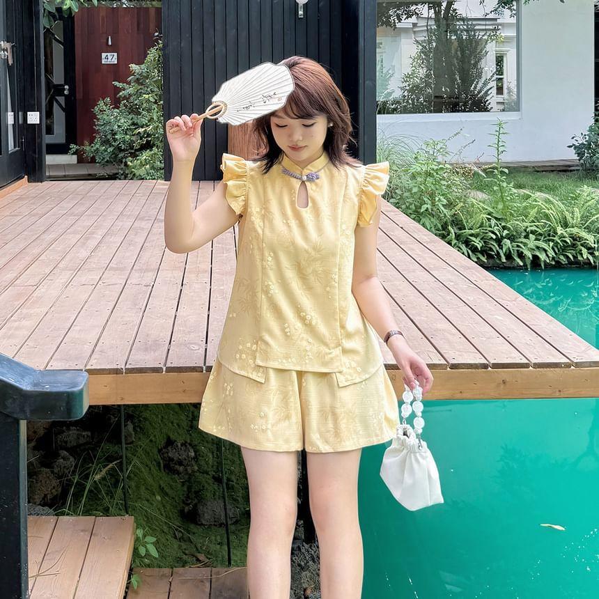 Plus Size Cap-Sleeve Stand Collar Floral Print Cutout Frog Buttoned Blouse Product Image