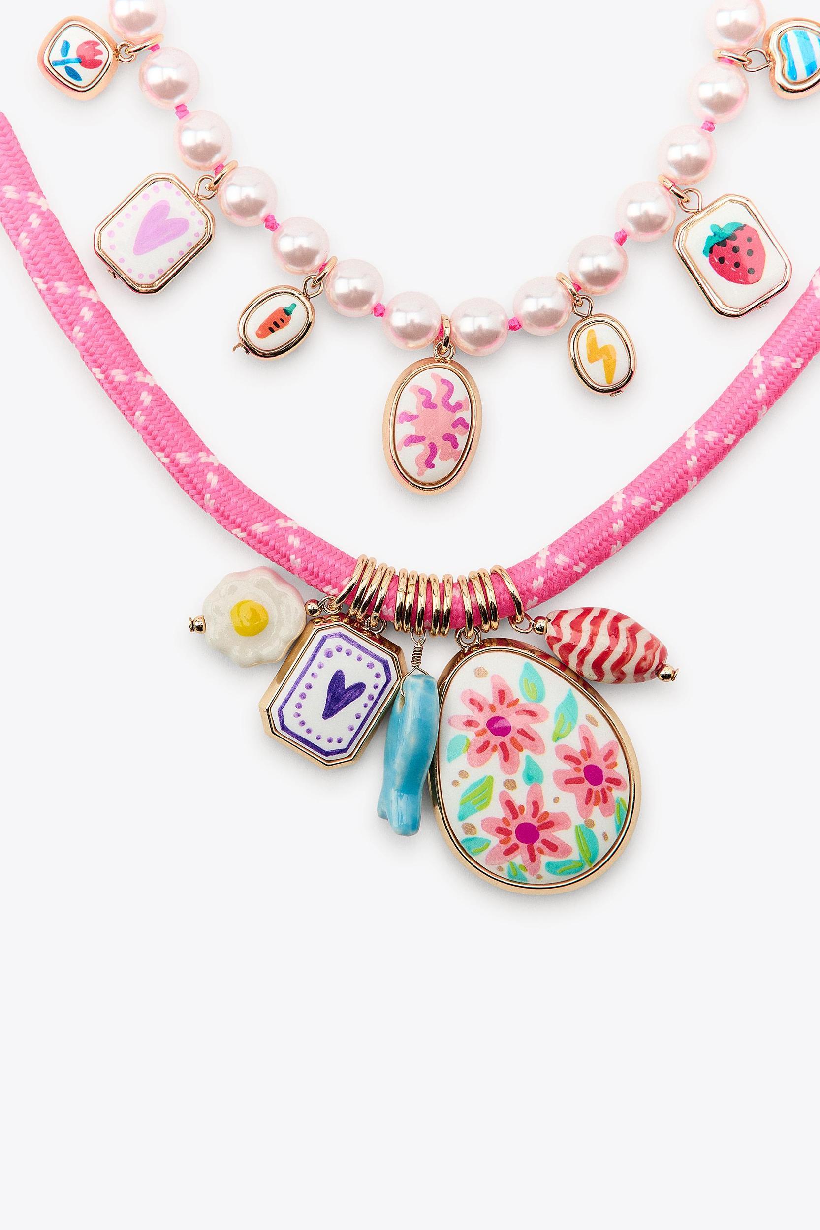 PACK OF 2 PEARL CORD CHARM NECKLACES Product Image