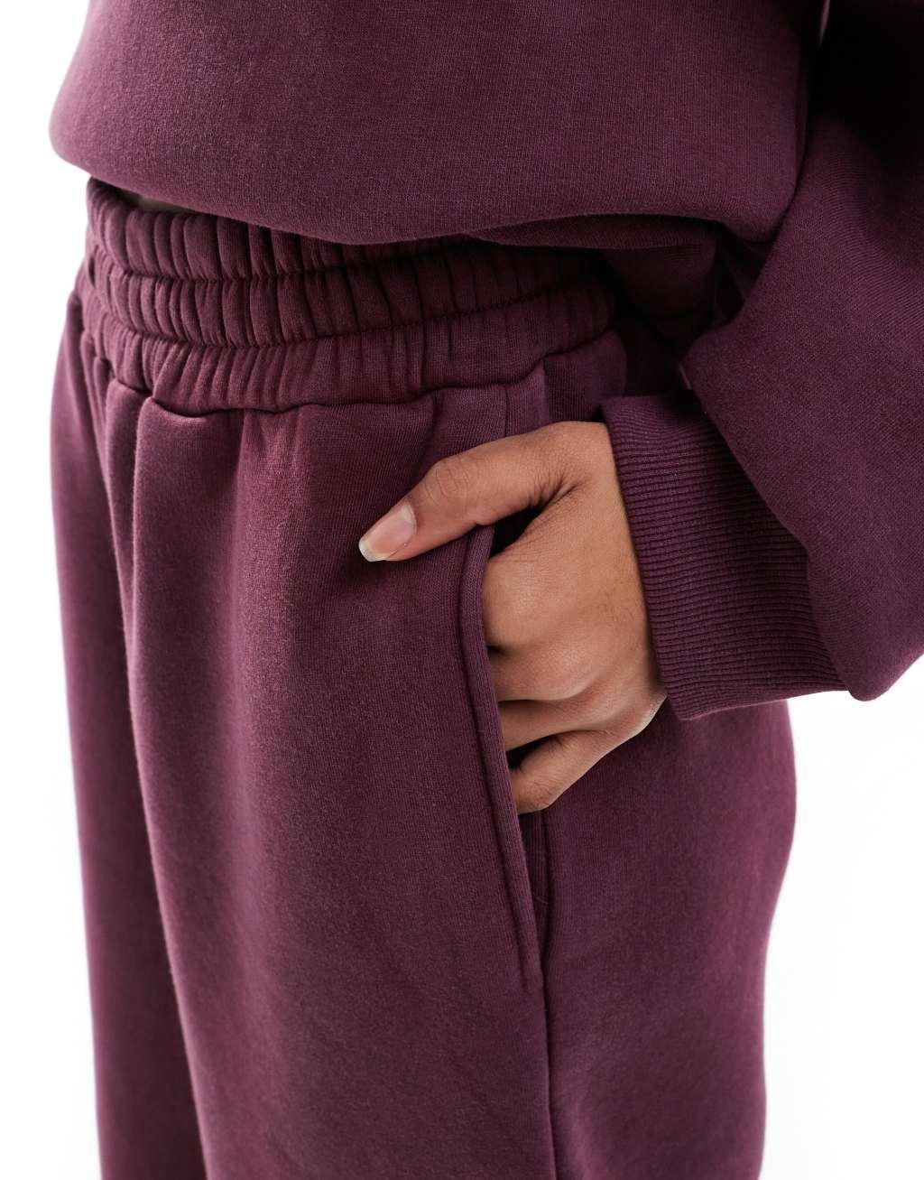 ASOS DESIGN cocoon leg sweatpants in acid wash burgundy - part of a set Product Image