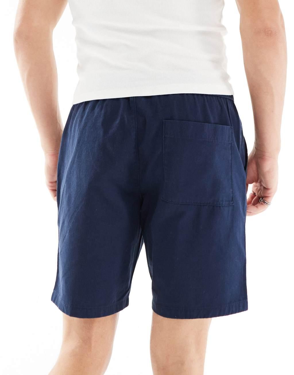 ASOS DESIGN slim chino shorts in navy Product Image