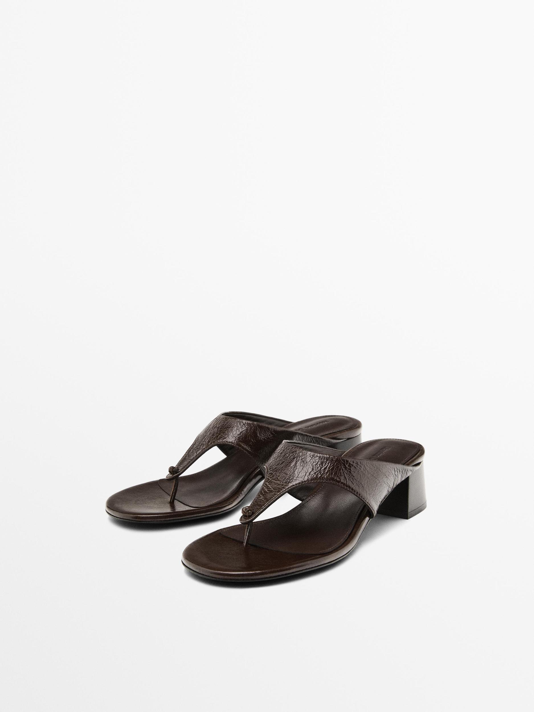 Heeled sandals with toe divider Product Image