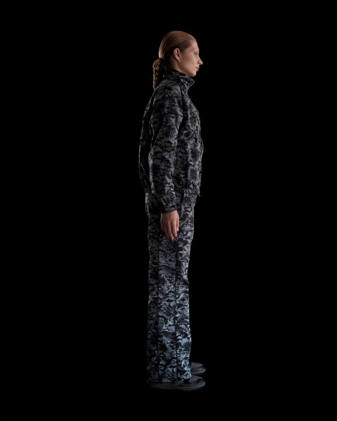 Nike Sportswear Windrunner Women's UV Protection Mid-Rise Woven Printed Pants Product Image