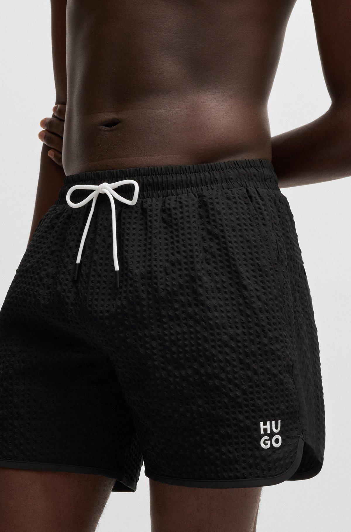 Waffle-structured swim shorts with embroidered stacked logo Product Image