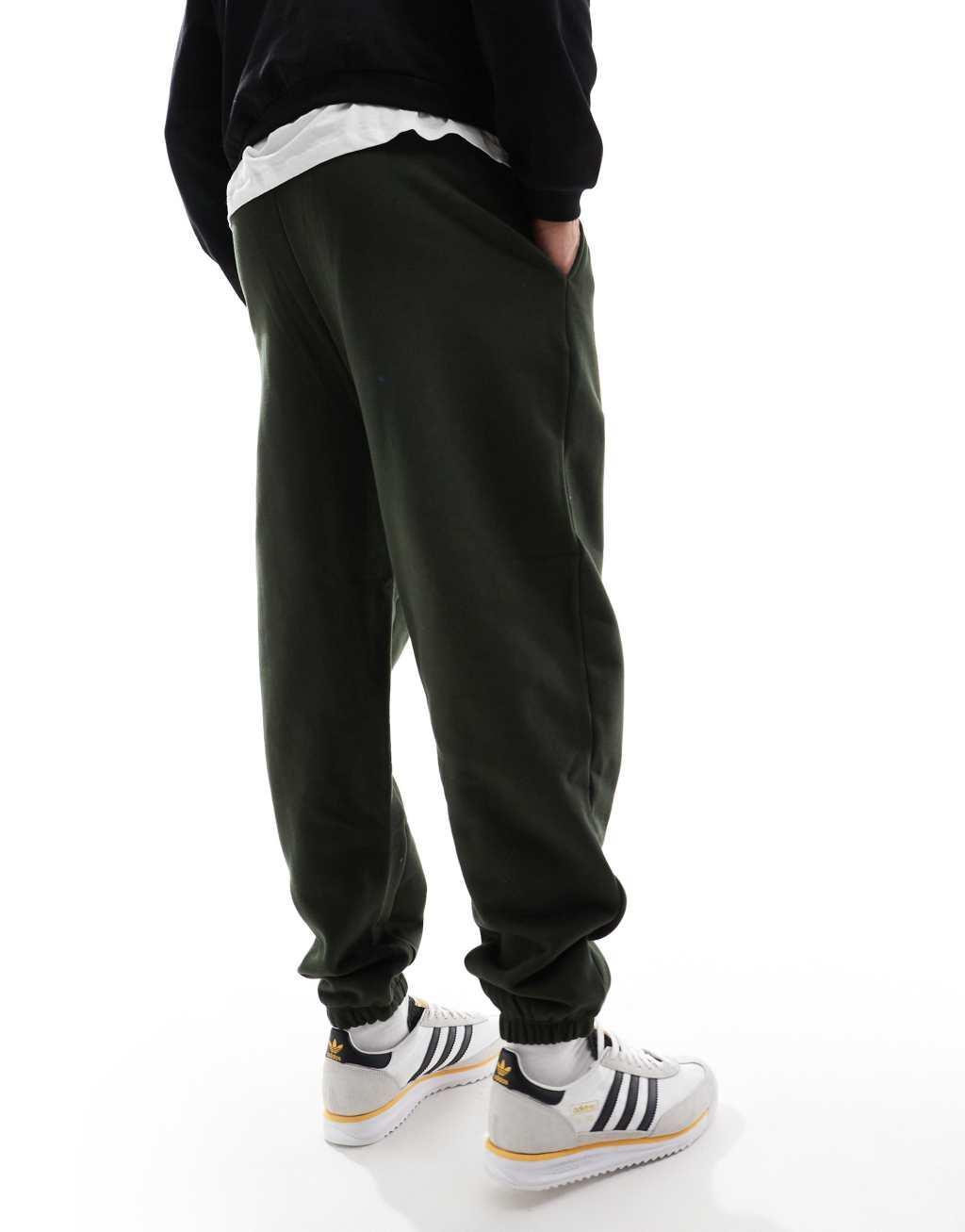 ASOS DESIGN premium heavyweight oversized sweatpants 400gsm in dark green  Product Image