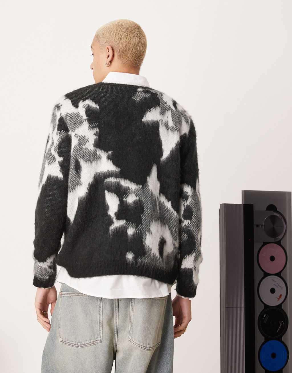 ASOS DESIGN relaxed knit crew neck sweater in black with floral pattern Product Image