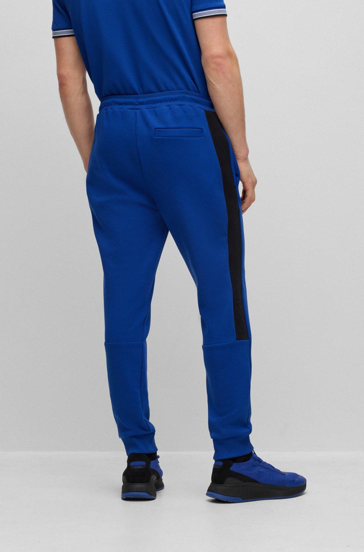Cotton-blend tracksuit bottoms with side-stripe tape Product Image