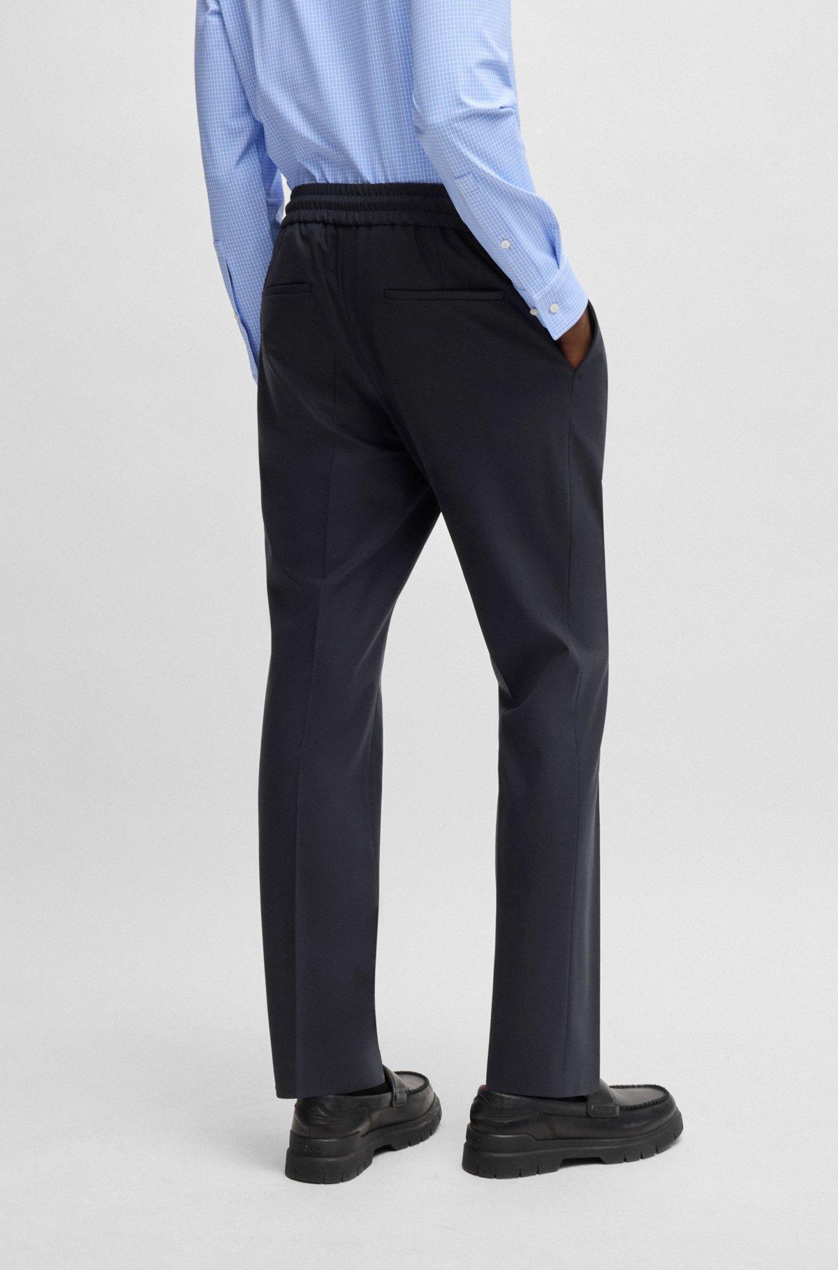 Slim-fit trousers in wool Product Image