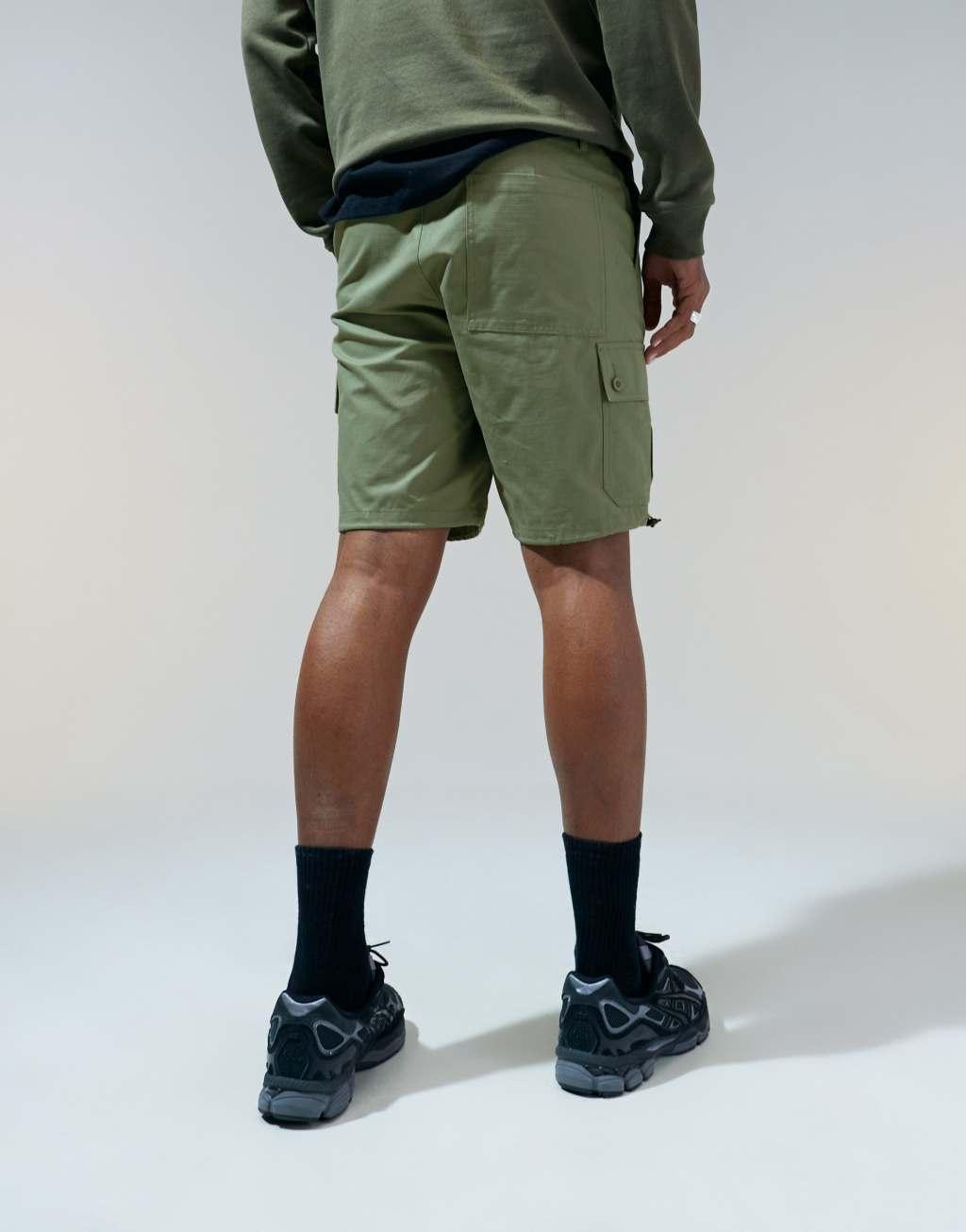 ASOS DESIGN slim cargo shorts in khaki Product Image