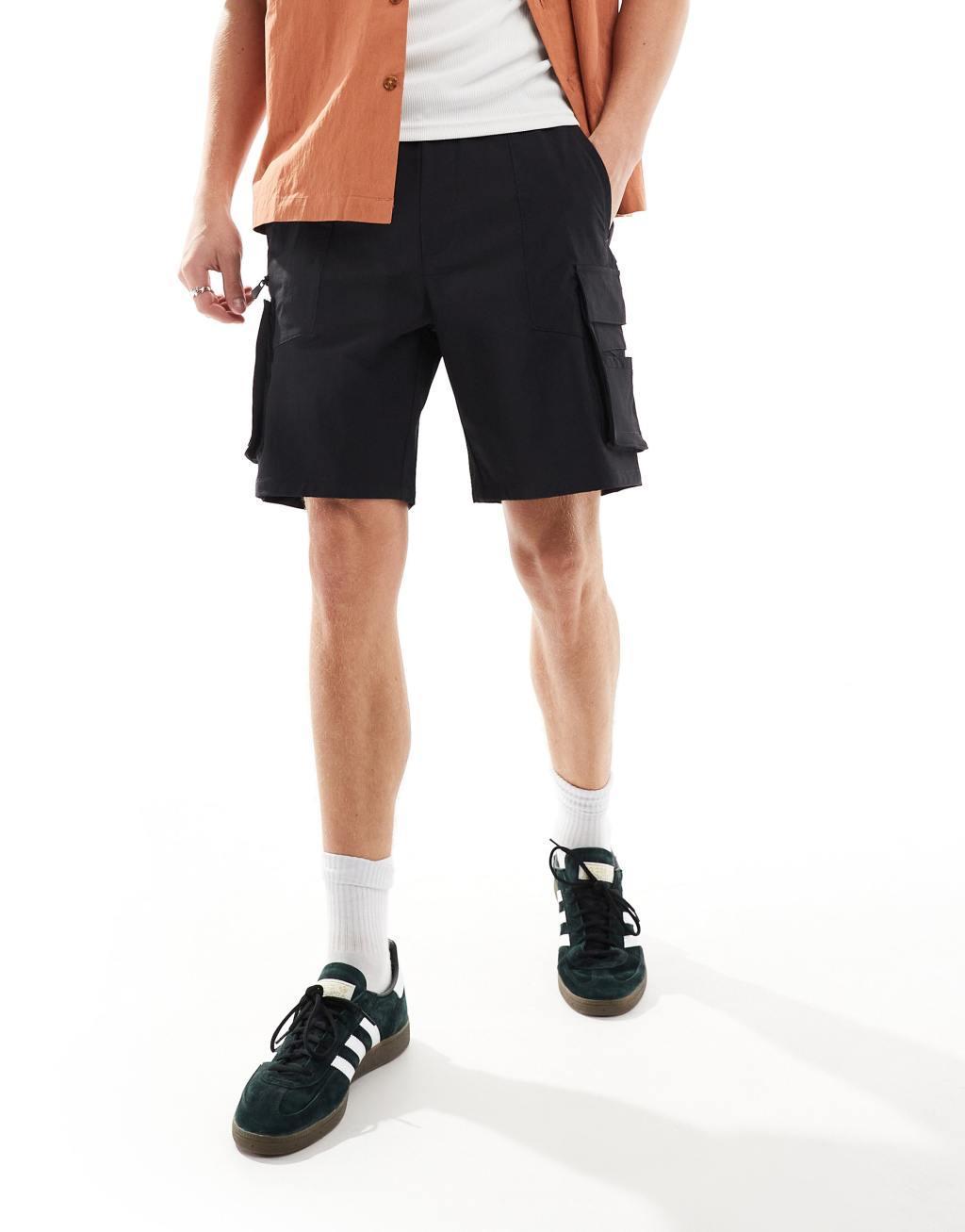 Bershka nylon cargo pocket shorts in black Product Image