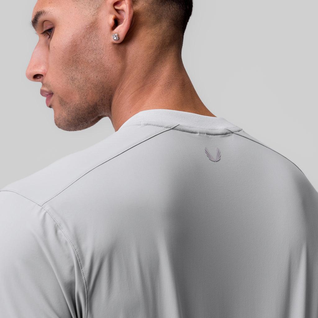 1087. Tetra-Lite® Ice Zip Tee - Light Sky Product Image