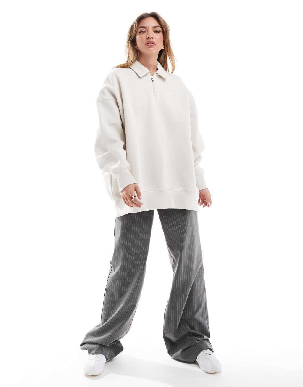 Nike Phoenix Fleece oversized 1/2 zip polo sweatshirt in beige Product Image