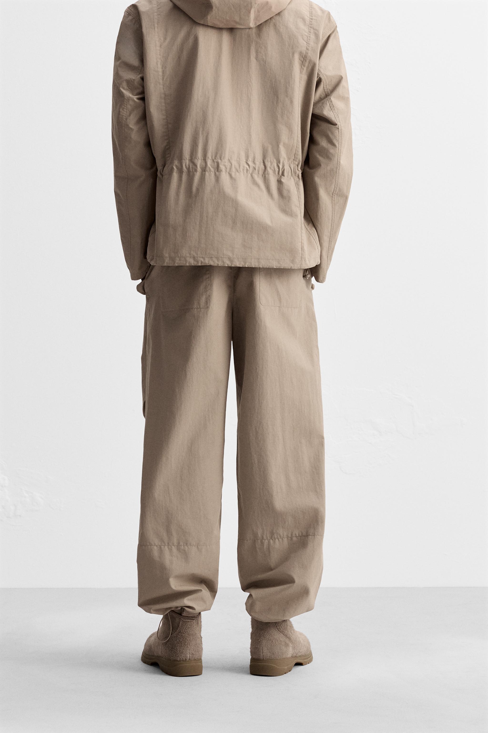 TECHNICAL WATER REPELLENT PARACHUTE PANTS Product Image