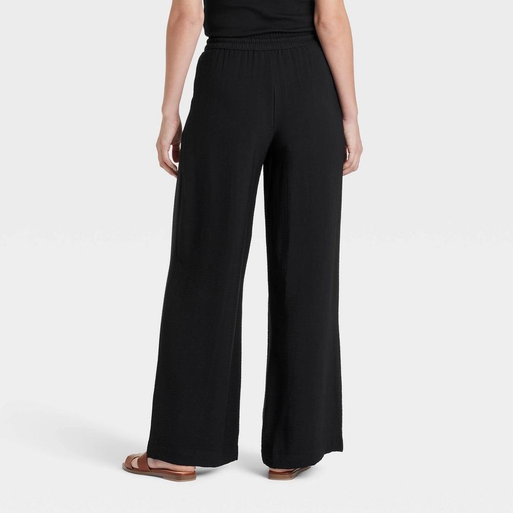 Women's High-Rise Wide Leg Pull-On Pants - A New Day™ Black XS: Midweight Woven Fabric, 32" Inseam, Side Pocket Product Image