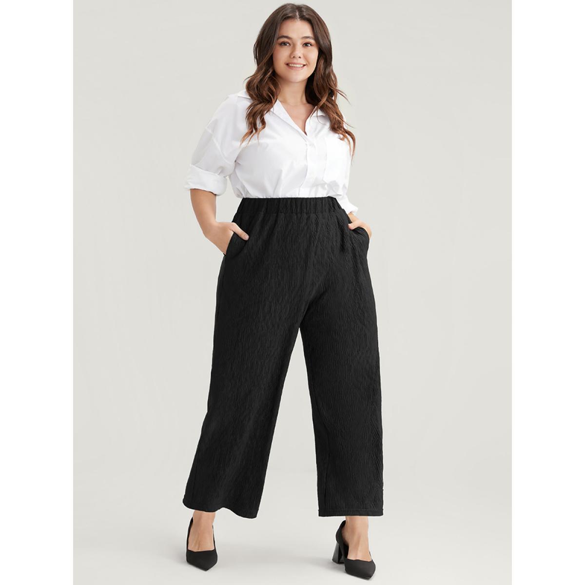 Plus Size Solid Pocket Textured Elastic Waist Pants Women Black Casual Mid Rise Dailywear Pants BloomChic 28/5X Product Image