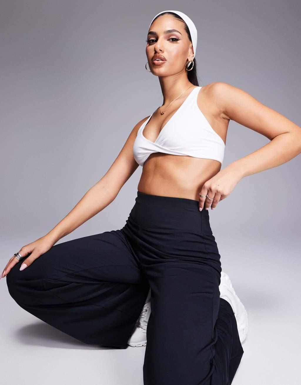4505 soft touch light support twist front sports bra in white  Product Image