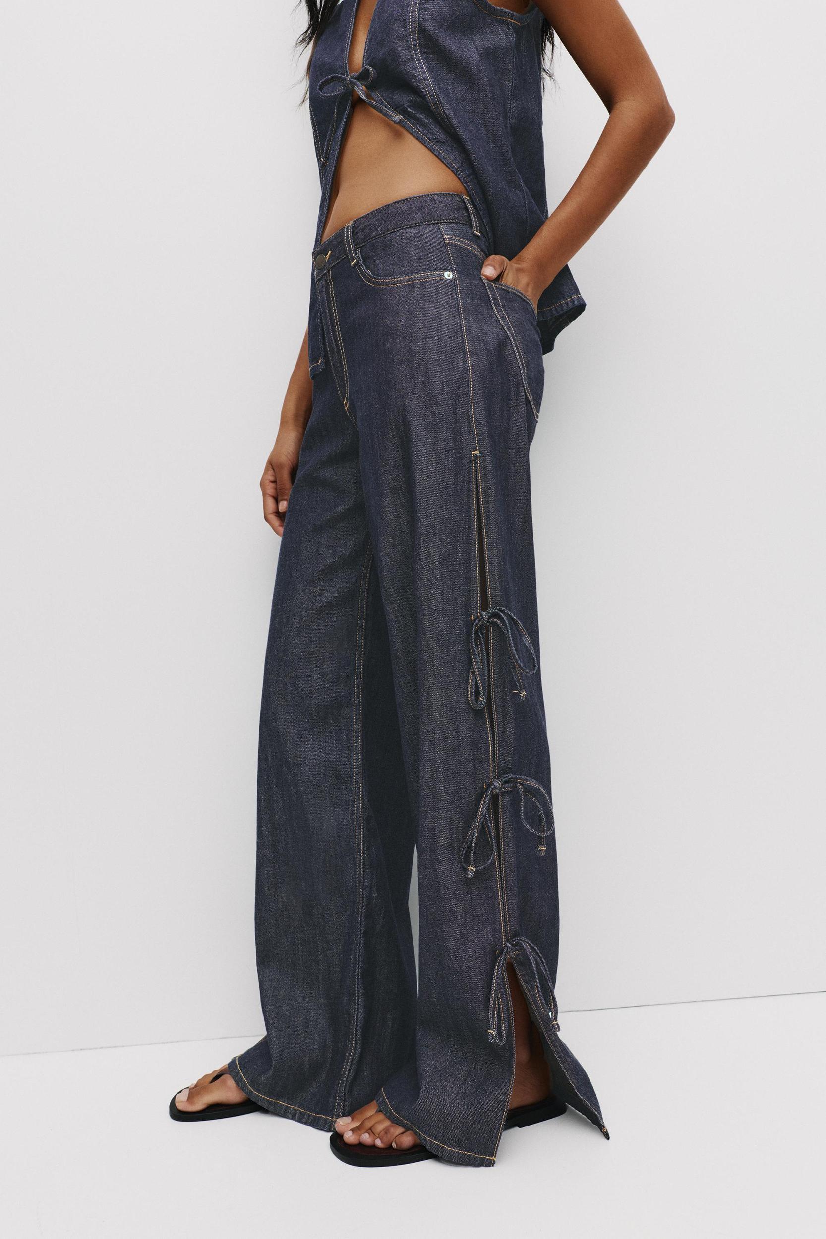 Wide-leg jeans with bows Product Image